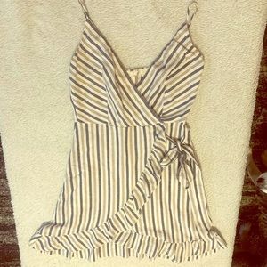 Cream and blue striped dress.